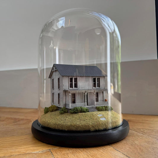 Model of Halloween Michael Myers movie house in glass dome. Halloween 1978