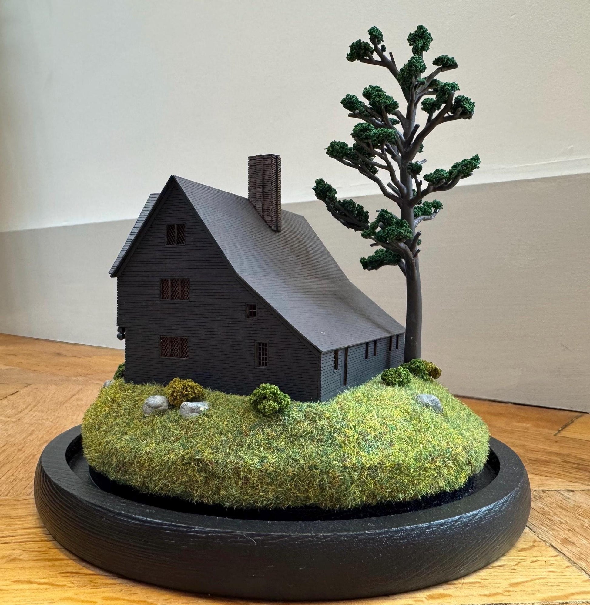 Model miniature Salem Witch House in glass dome