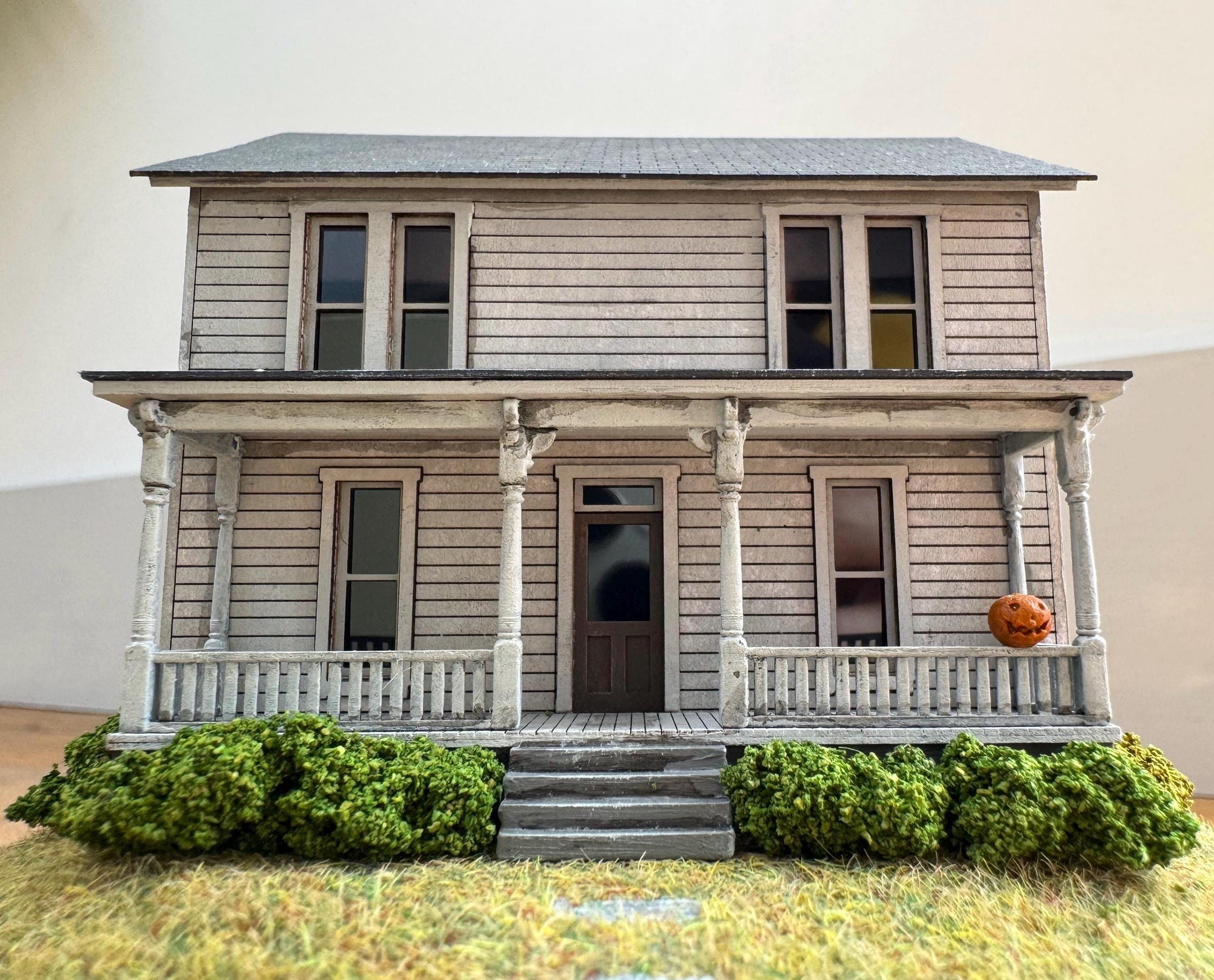 Model of Halloween Michael Myers movie house in glass dome. Halloween 1978
