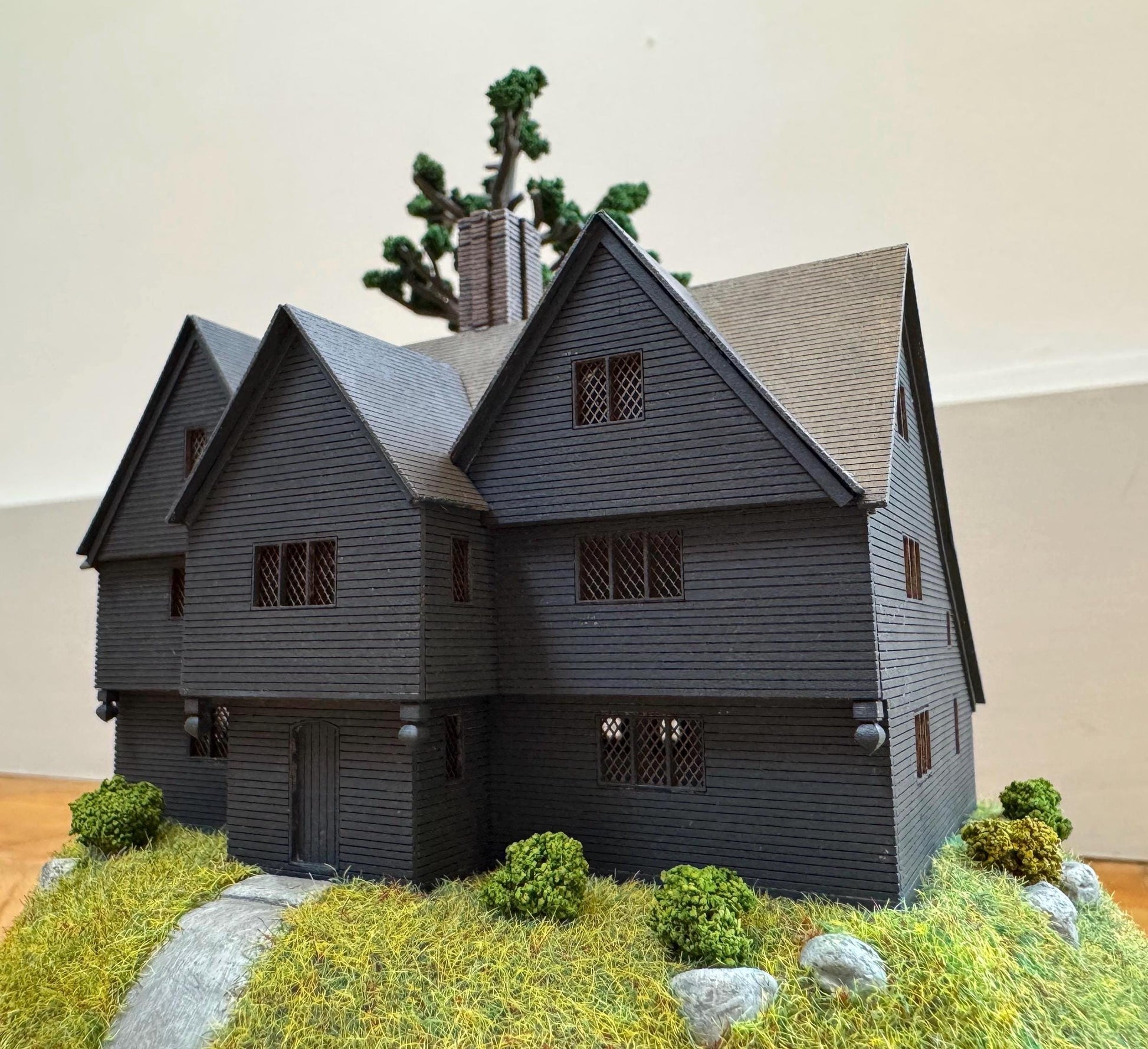 Model miniature Salem Witch House in glass dome