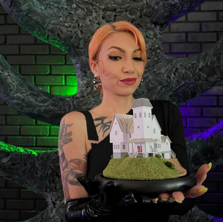 Model of Beetlejuice movie house in glass dome. Maitlands House