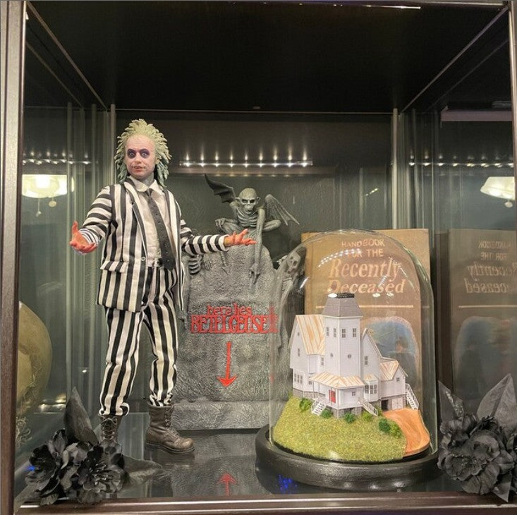 Model of Beetlejuice movie house in glass dome. Maitlands House