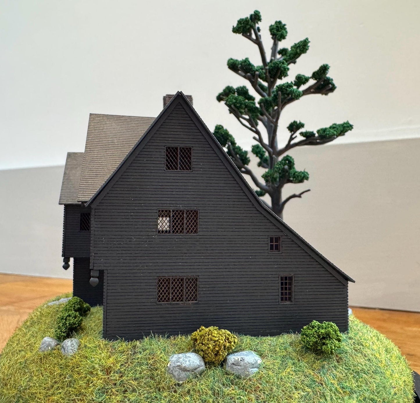 Model miniature Salem Witch House in glass dome