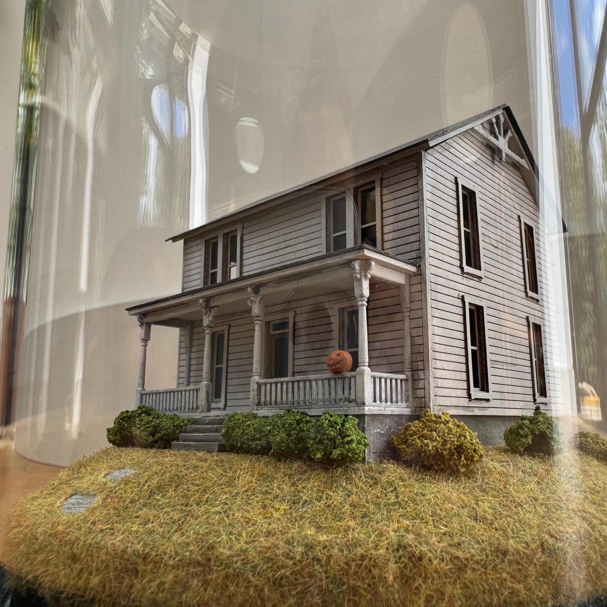 Model of Halloween Michael Myers movie house in glass dome. Halloween 1978