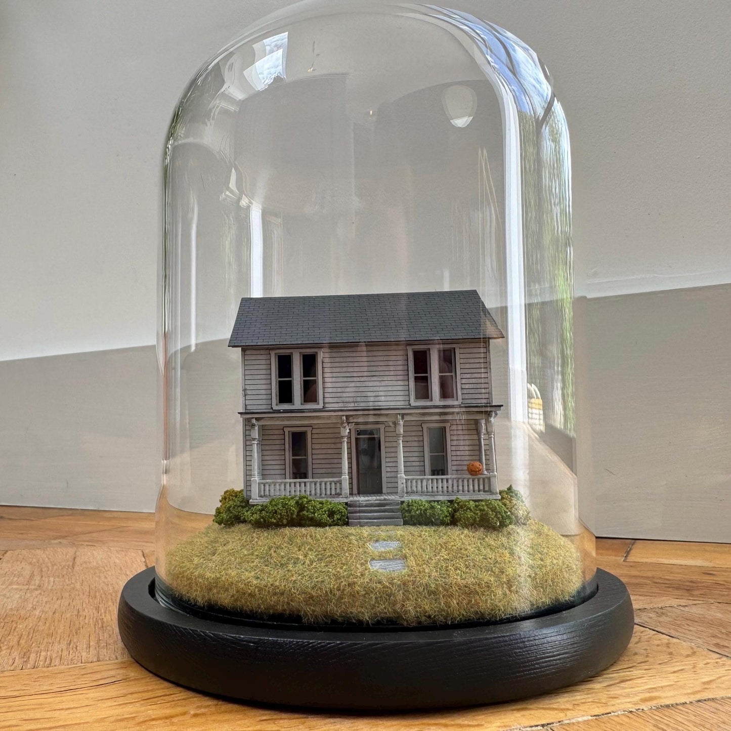 Model of Halloween Michael Myers movie house in glass dome. Halloween 1978