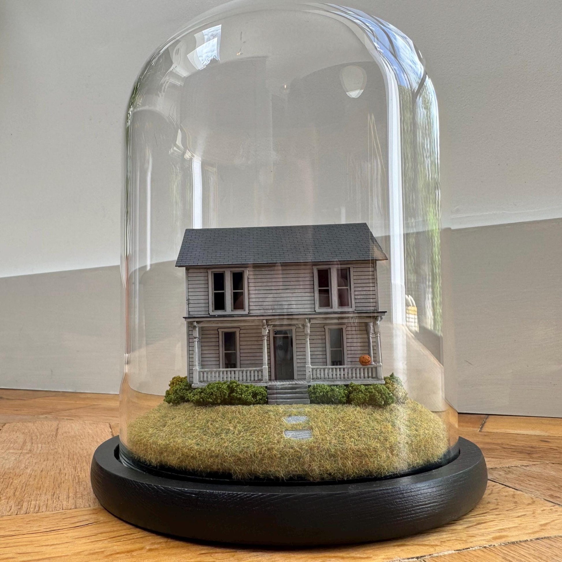 Model of Halloween Michael Myers movie house in glass dome. Halloween 1978